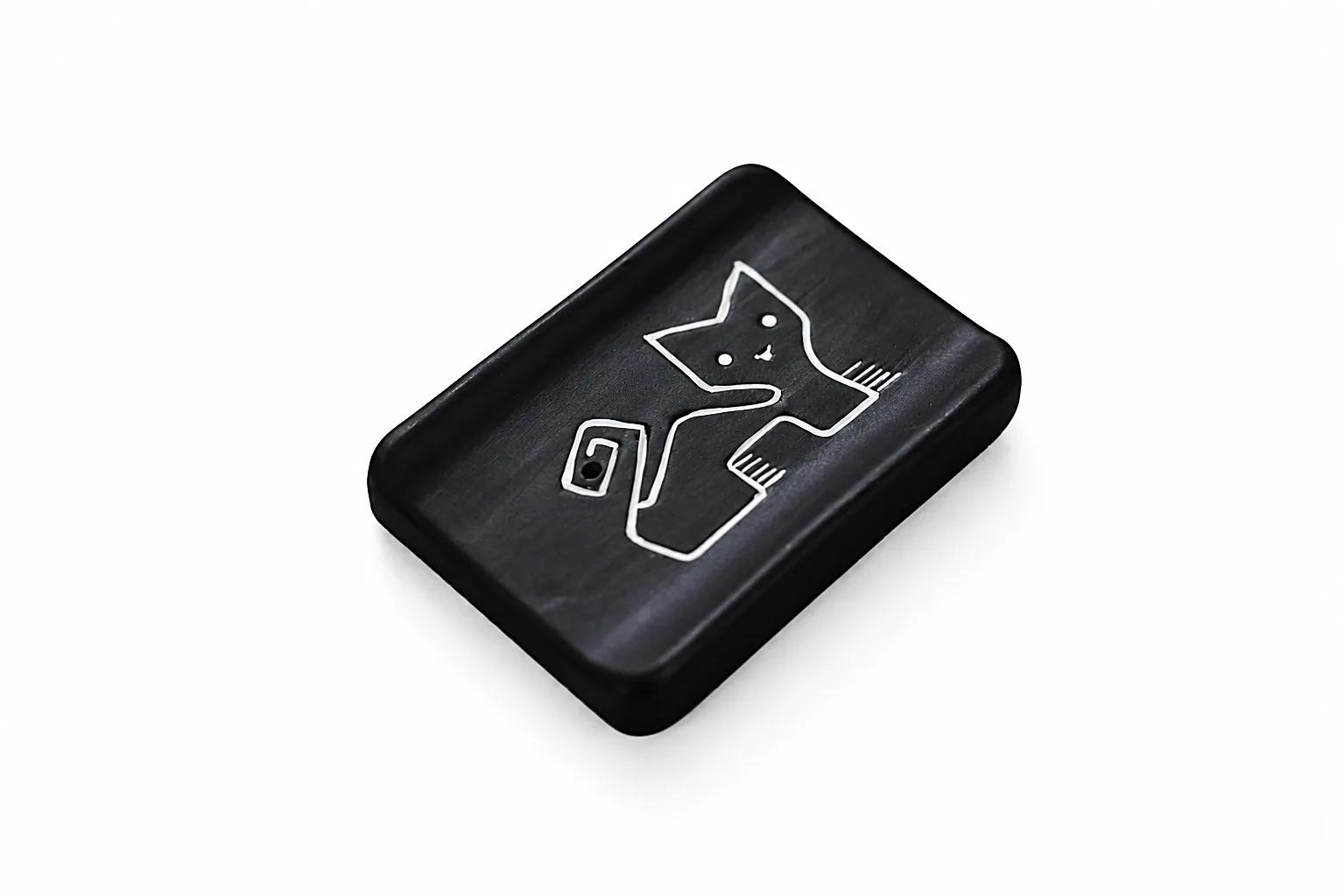 Munay Puma black ceramic incense holder with a hand-painted Andean puma design